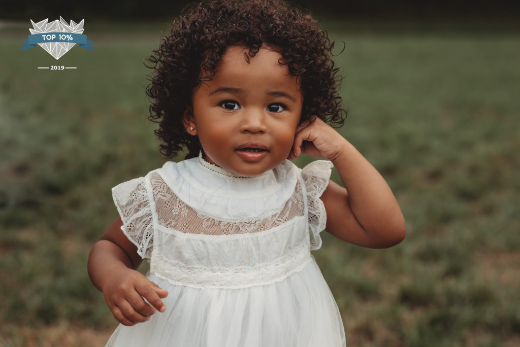 toddler girl poses for picture in Bowie, MD