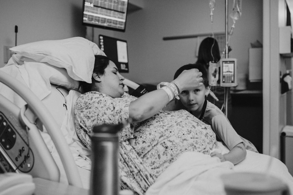 sibling says goodbye to mama during birth of baby in Annapolis, MD at AAMC