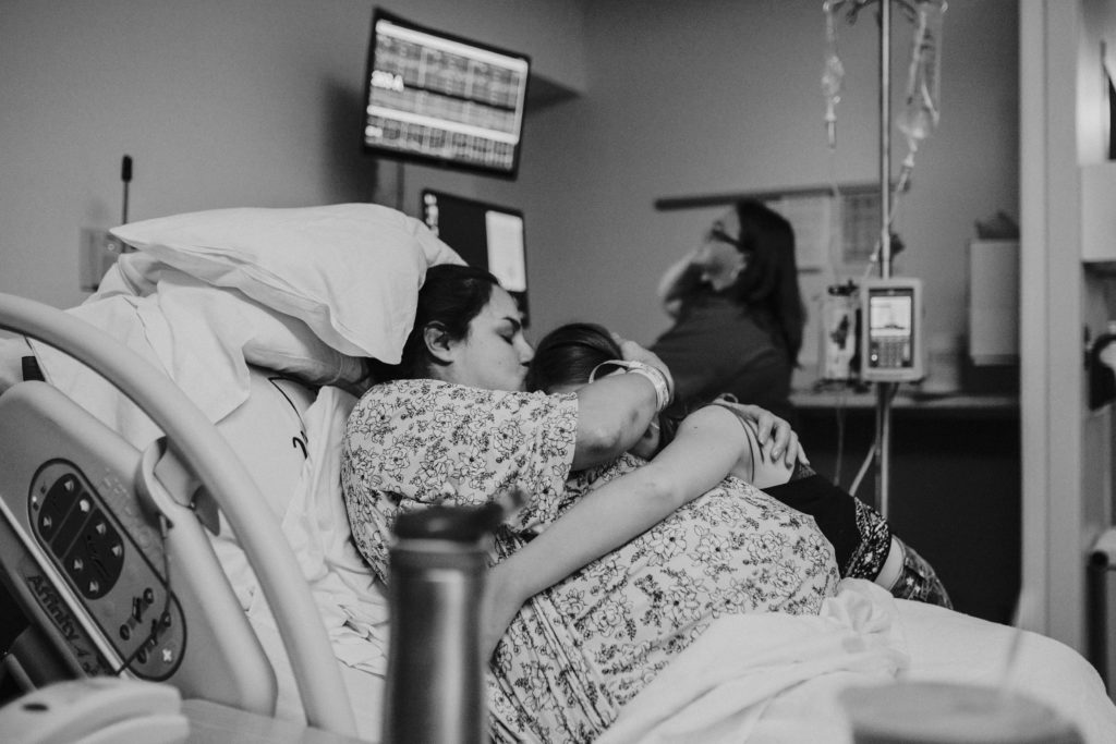 sibling says goodbye to mama during birth of baby in Annapolis, MD at AAMC