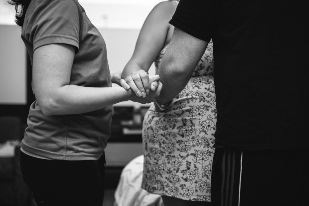 Hand squeeze during birth in Annapolis, MD at AAMC