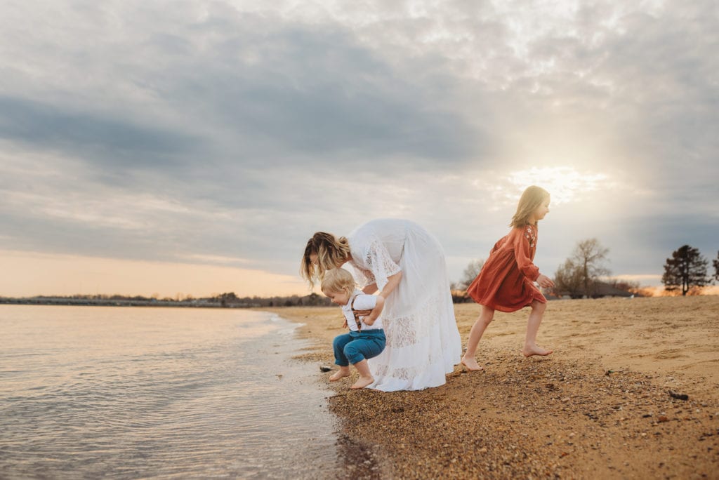 mom and kids on beach in St. Pete for family photo session