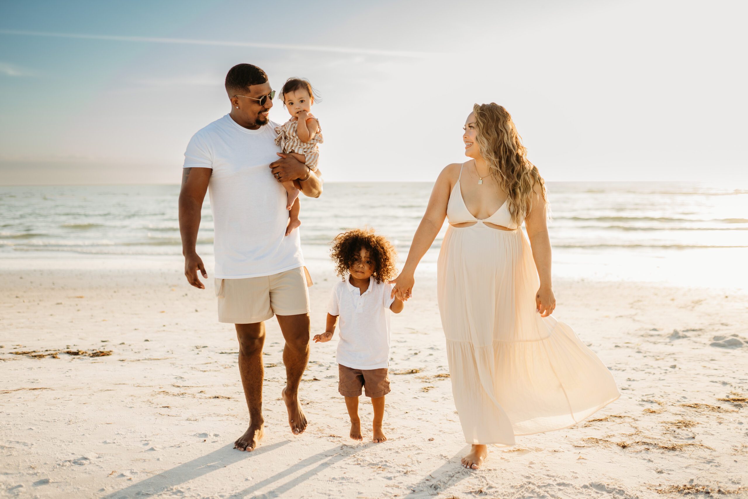 tampa family prepares for birth with a tampa doula with maternity session at beach