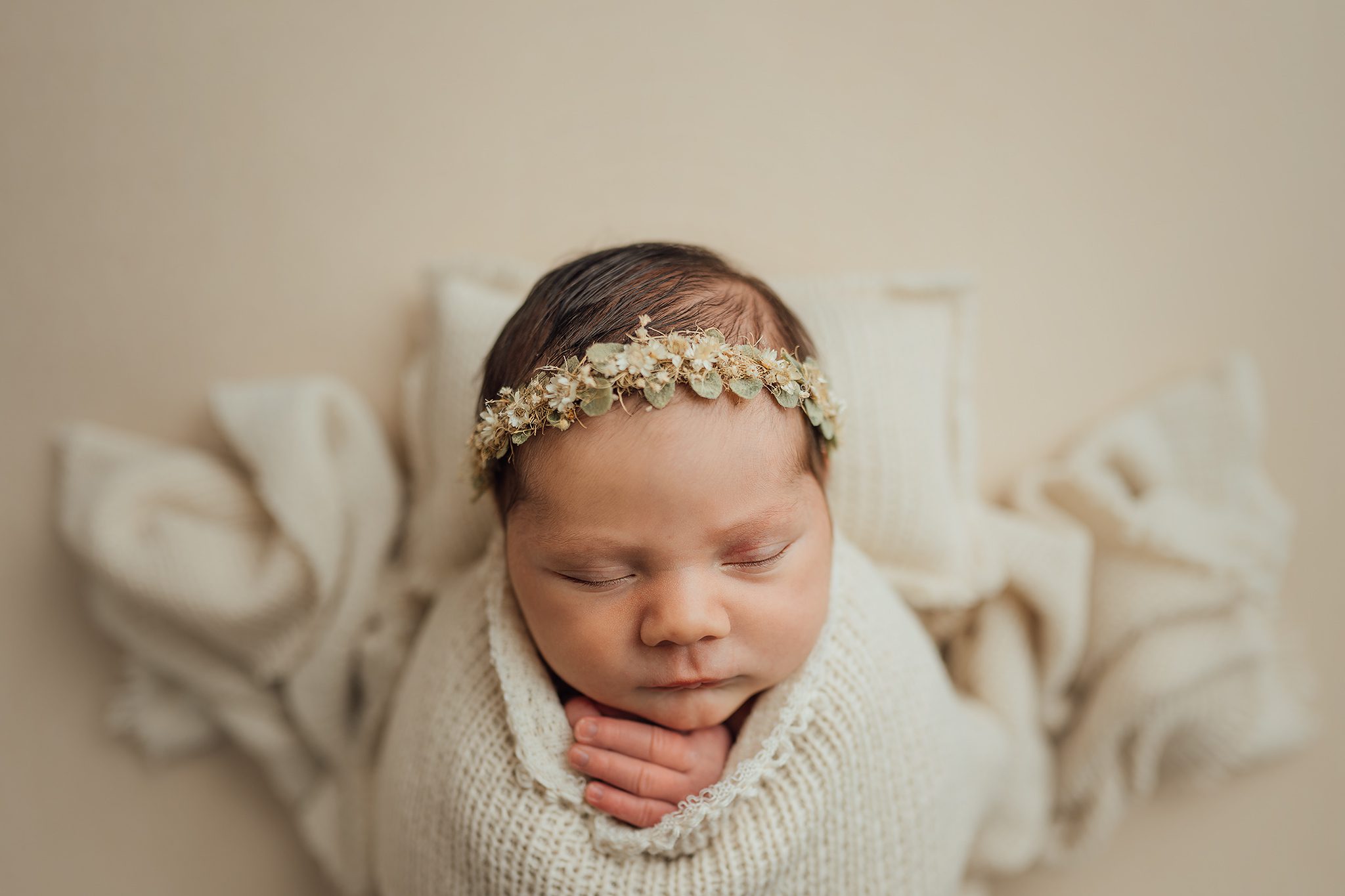 newborn baby girl sleeping during photo session in Tampa